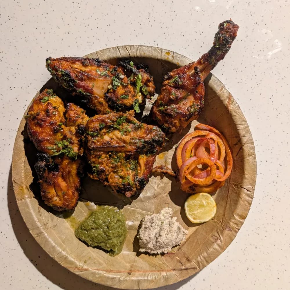 Tandoori Chicken, served on a leaf pattal